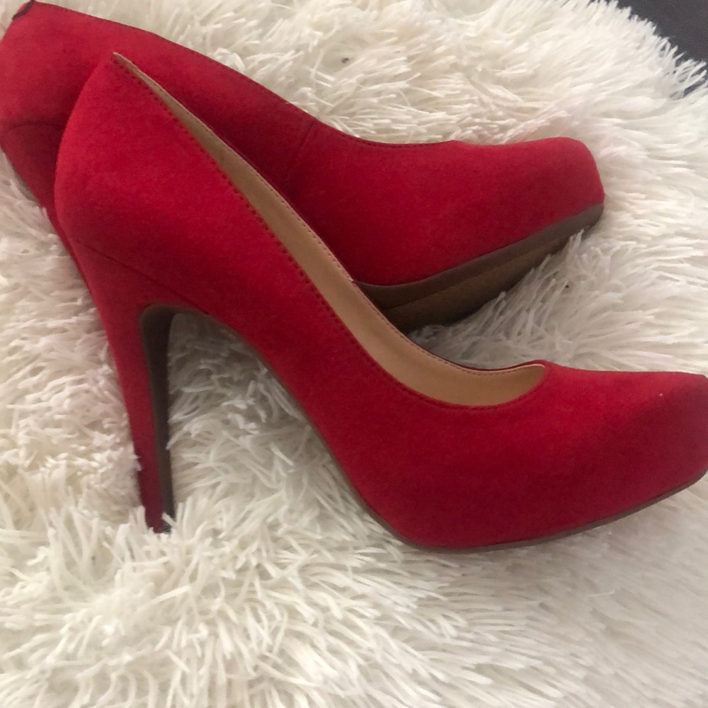 Jessica Simpson red pumps never worn